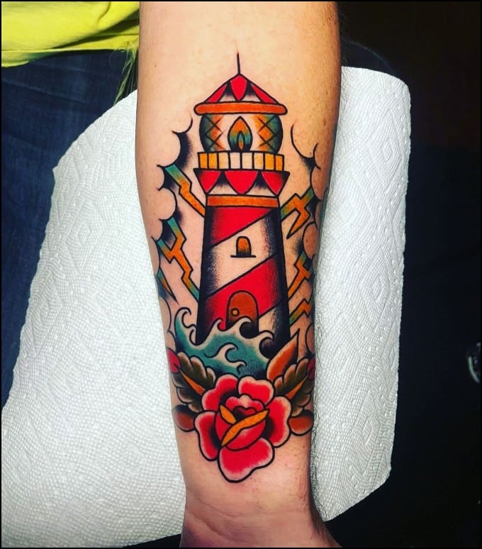 red color lighthouse tatoos