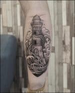 51+ Meaningful Lighthouse Tattoos: A Symbol of Guidance & Hope