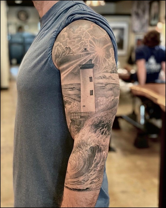lighthouse tattoos upper arm