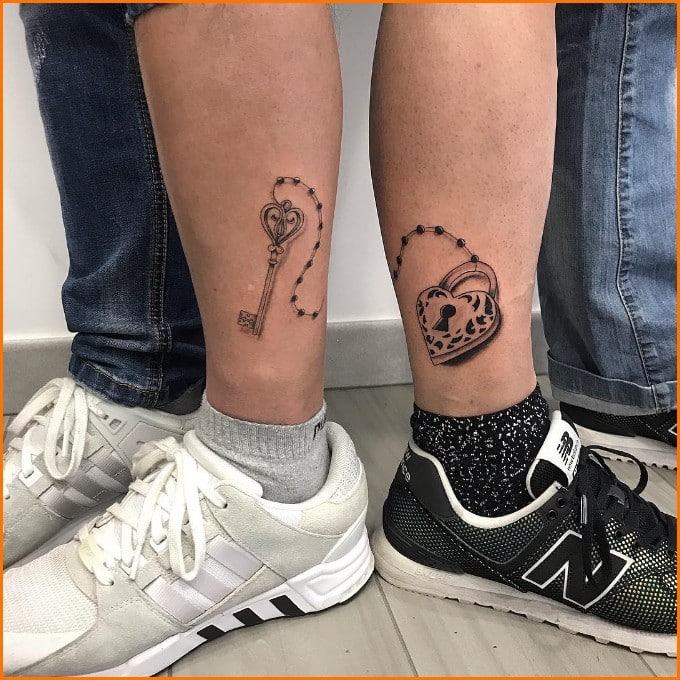 lock and key tattoo designs for couples on legs