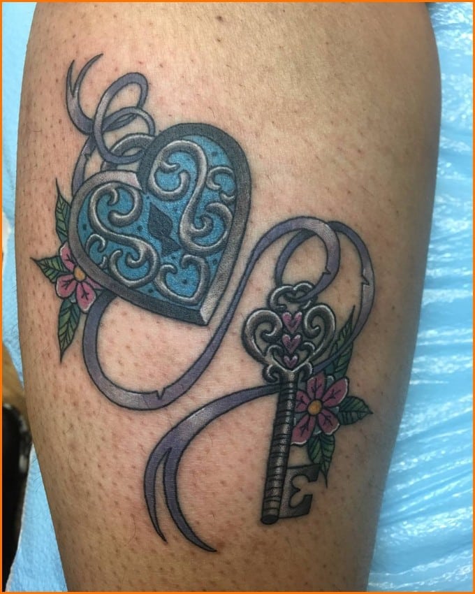 lock and key tattoos on forearms