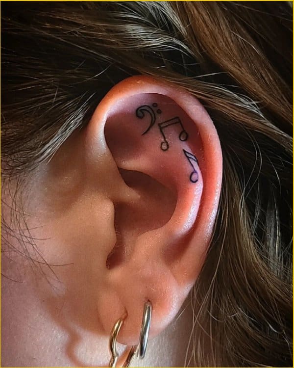 51 Good Looking Music Tattoos For Behind Ear