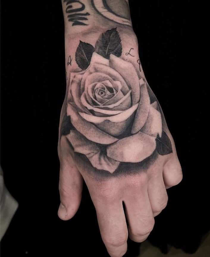 rose hand tattoo