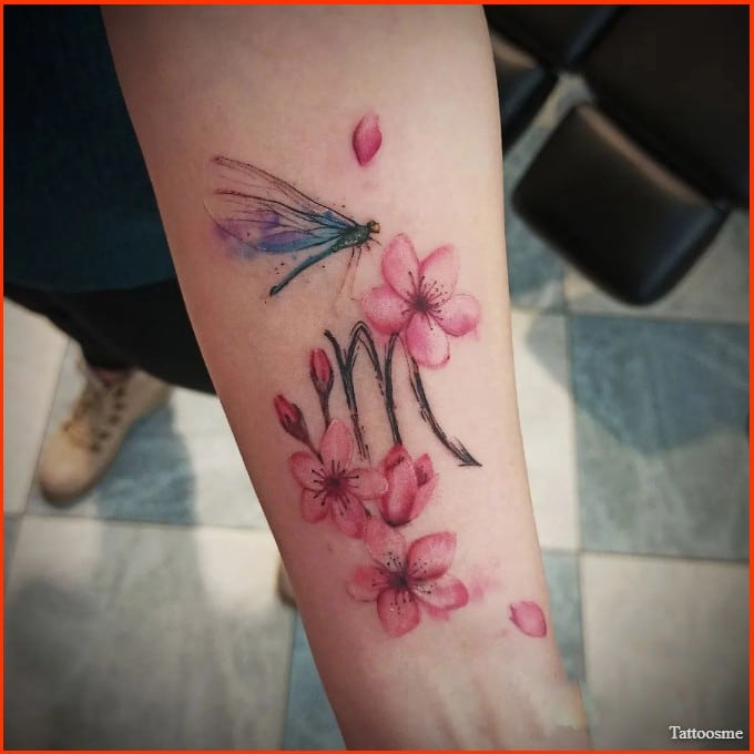 Minimalist Scorpio symbol tattoos on the arm