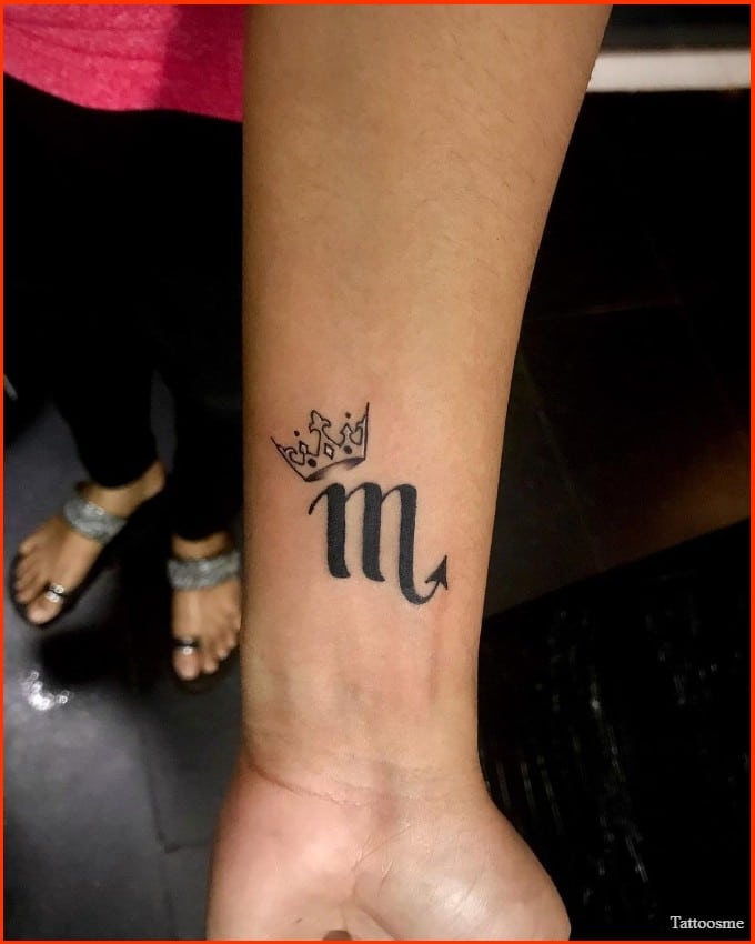 Astrological Scorpio tattoos with crown