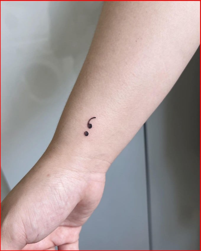 semicolon tattoo on wrist