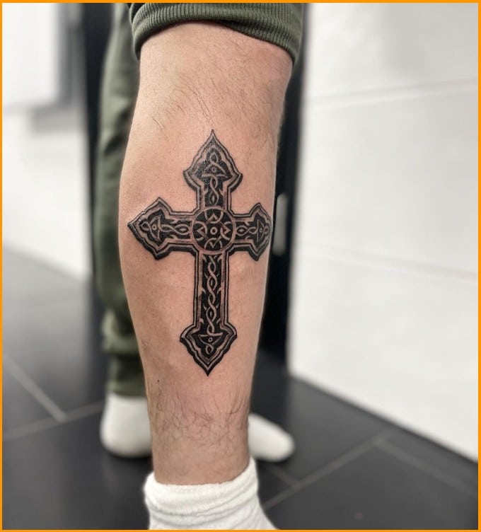 cross spiritual tattoos on arms
