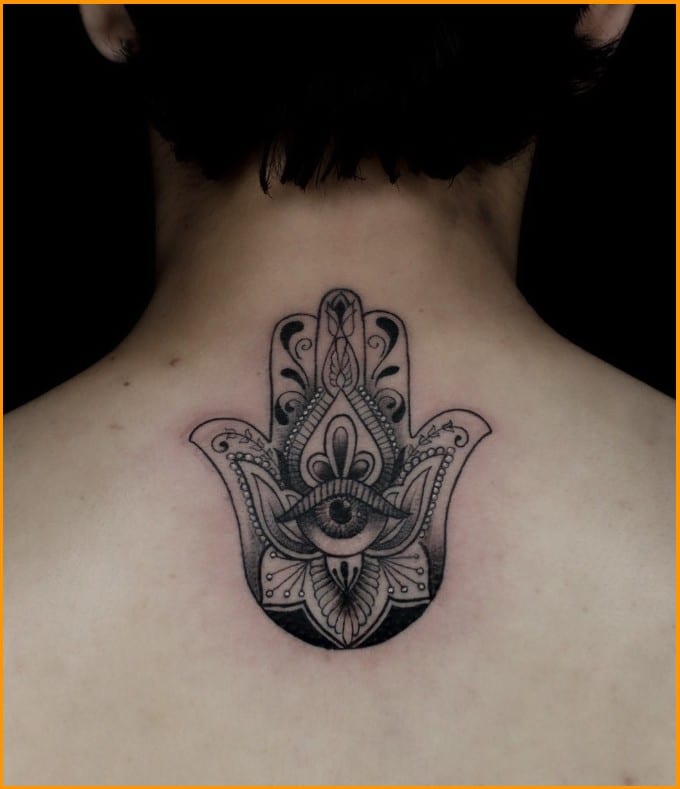 hamsa hand tattoos on back