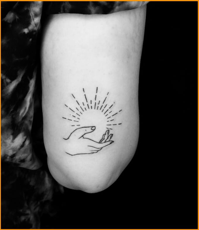 spiritual sun tattoo