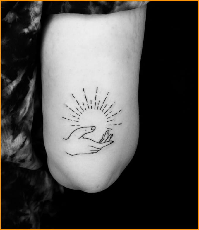 spiritual sun tattoo 