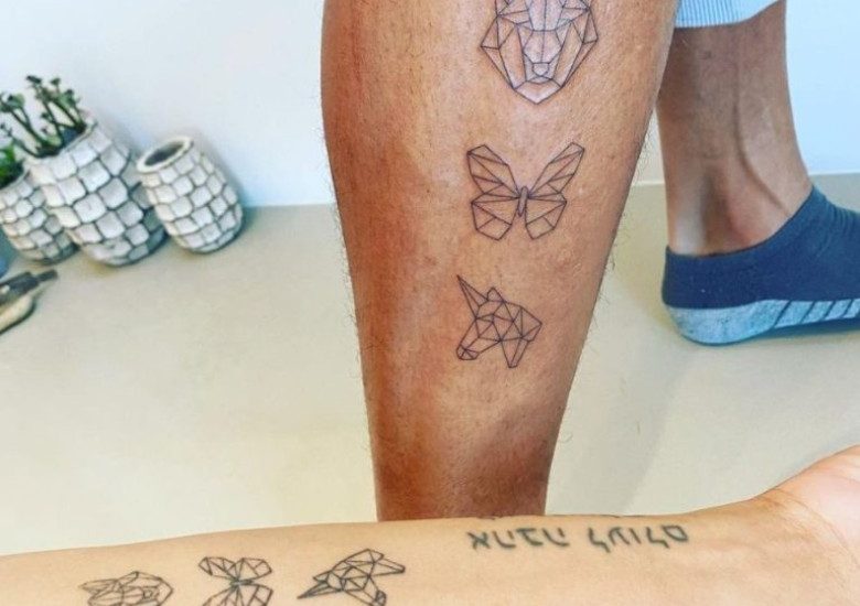 One of his newer tattoos is of a wolf,
Another recent addition is a tattoo of a butterfly, and third one is unicorn, all these three in Geometric tattoo shape. 