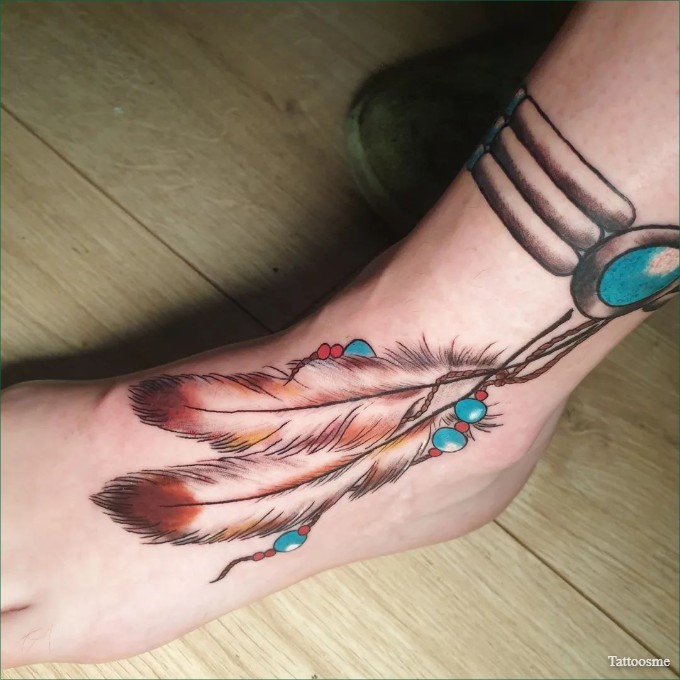 feather bracelet tattoo on foot
