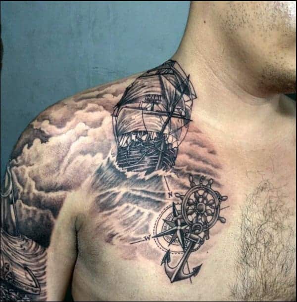 anchor tattoo on chest with map and a ship