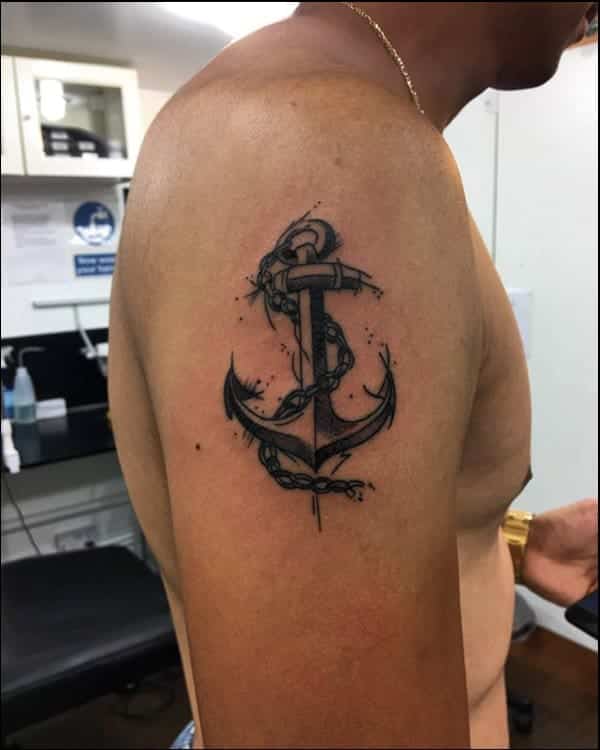 anchor tattoo with rope on hand