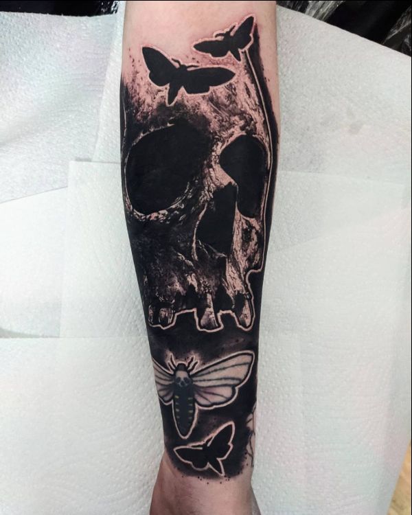 arm tattoos skulls designs 