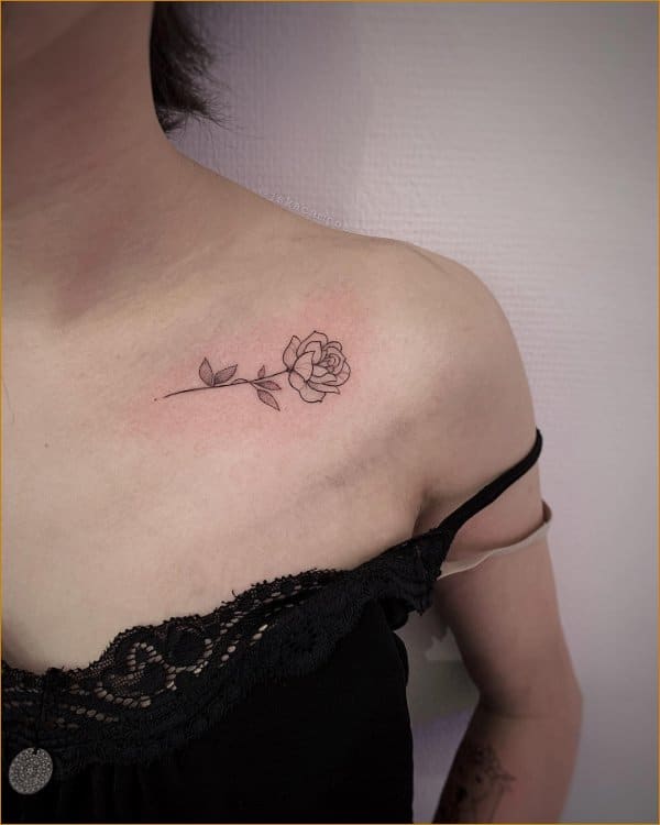 small flower collar bone tattoos