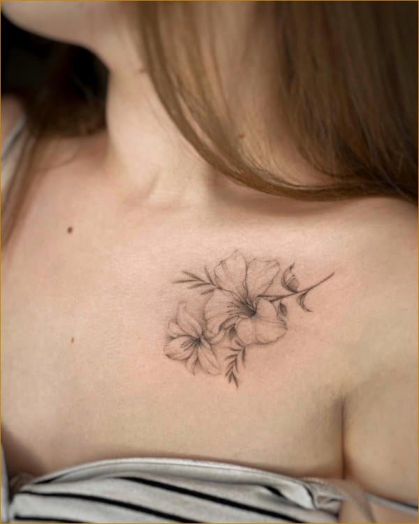 Flower tattoo on the shoulder and clavicle bone  Tattoogridnet