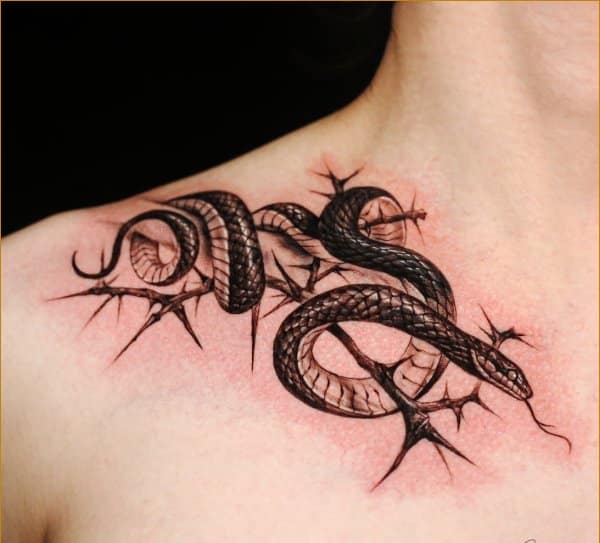 snake collar bone tattoos
