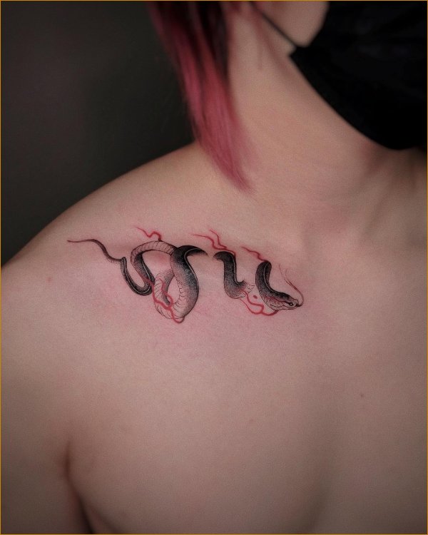 snake collar bone tattoos