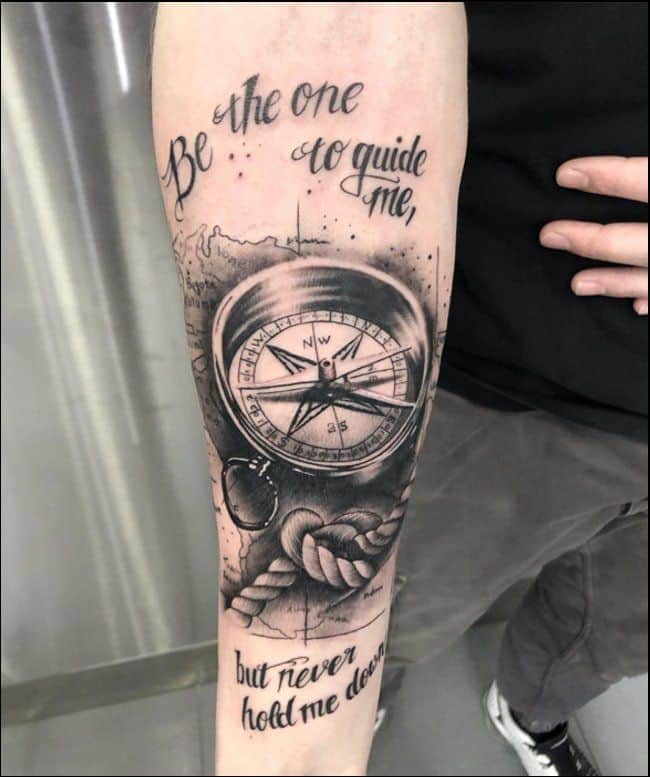 compass with rope tattoo on hand