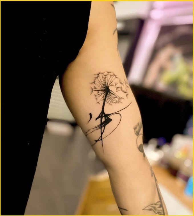 small dandelion tattoo