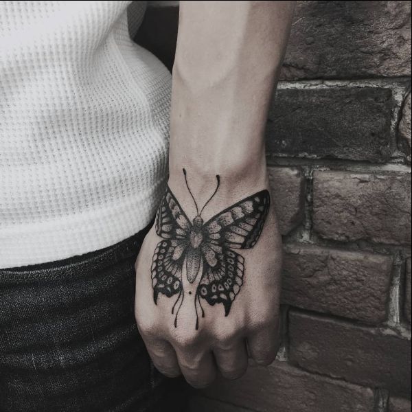 cute butterfly hand tattoos for women
