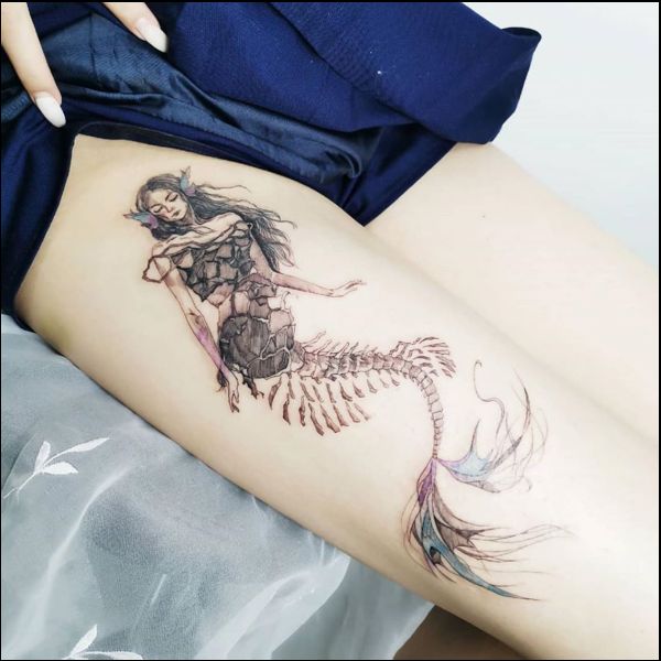mermaid tattoos on thigh