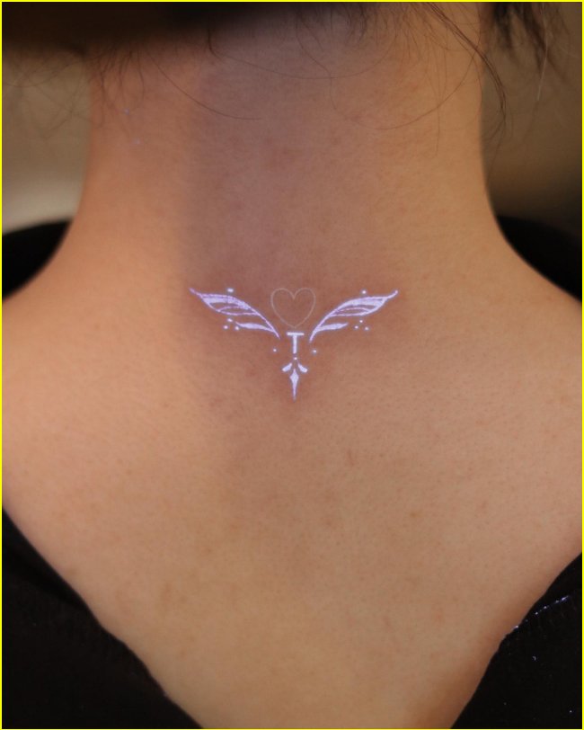 wings uv ink tattoos for neck