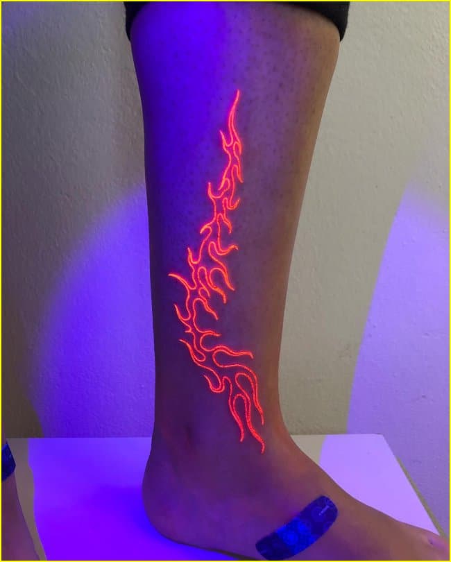 flames uv ink tattoos for legs