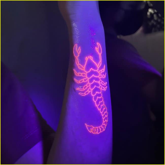 scorpio uv tattoo design on arm