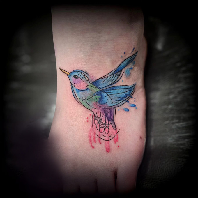 birds tattoo on foot