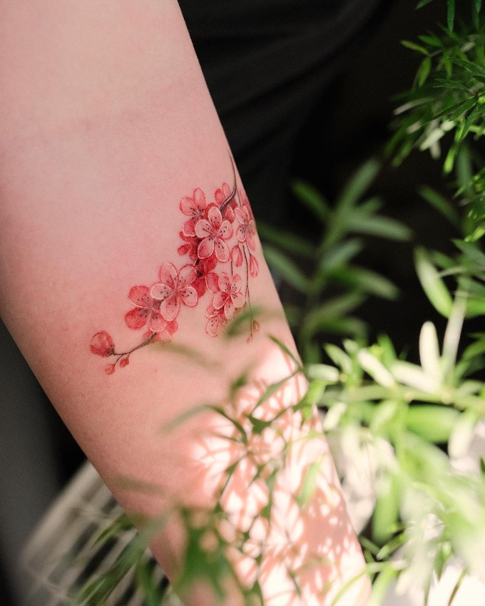 cherry blossom tattoo on hand