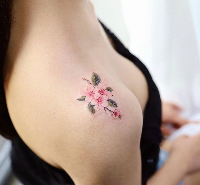 cherry blossom tattoo on shoulder