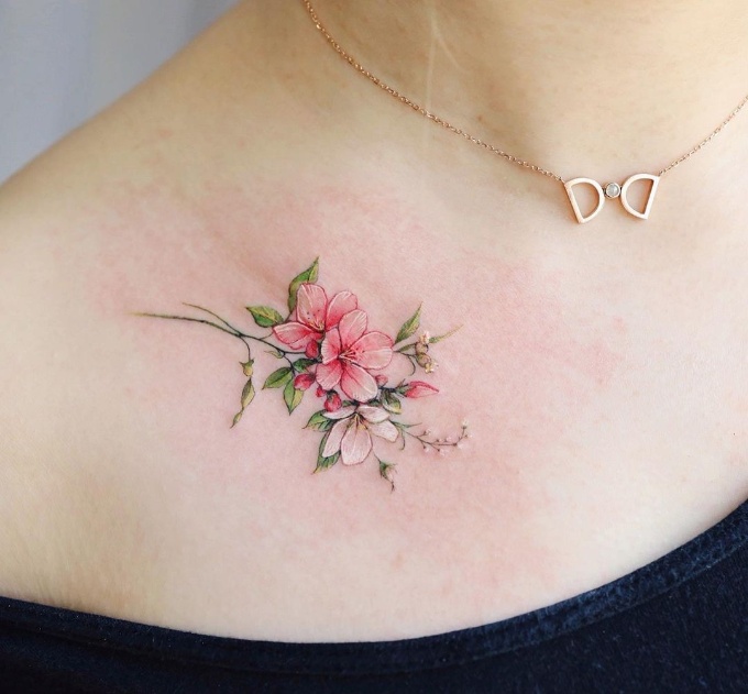 cherry blossom tattoo on chest for girls