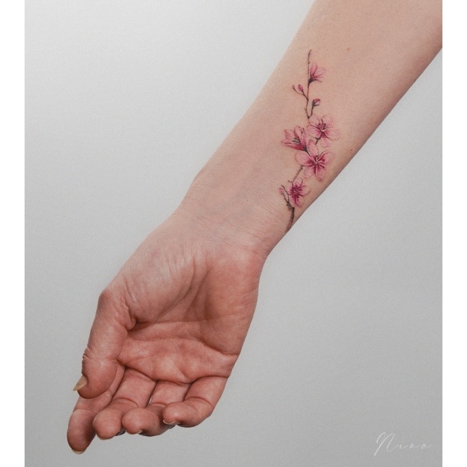 cherry blossom tattoo on wrist
