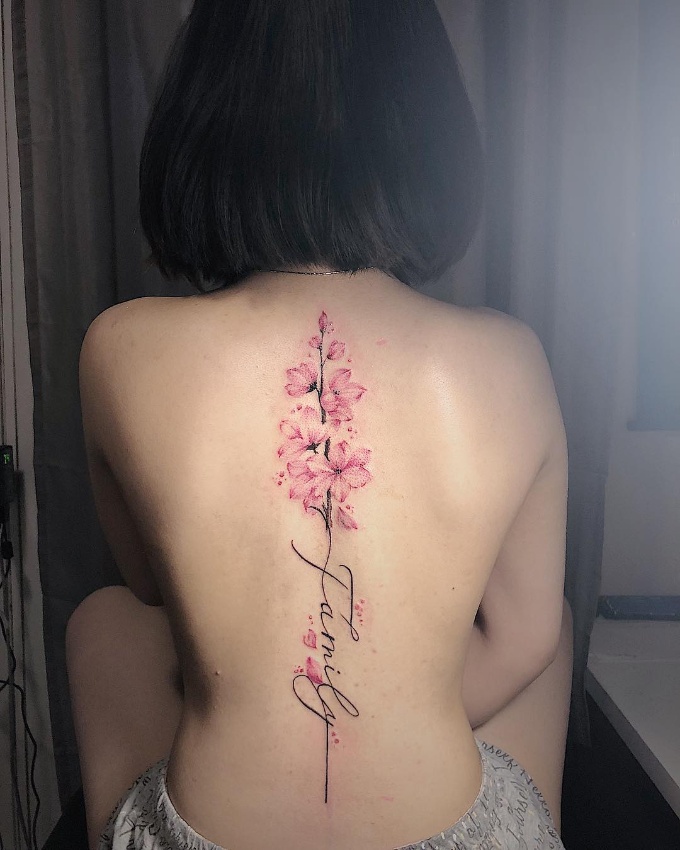 cherry blossom spine tattoo