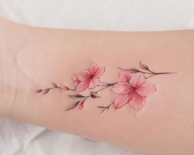 cherry blossom tattoo on arm for girls