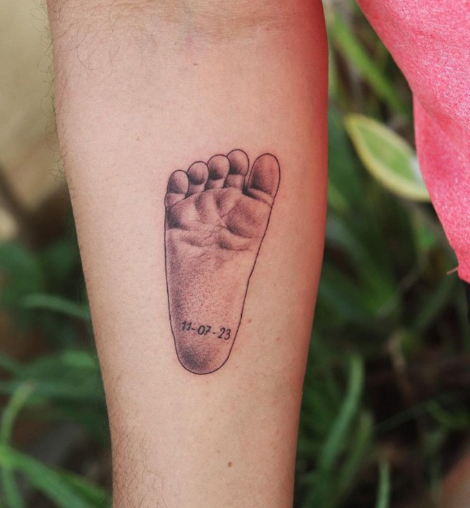 baby footprint tattoos on foot