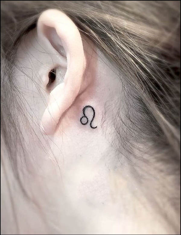 leo tattoos for females behind ear