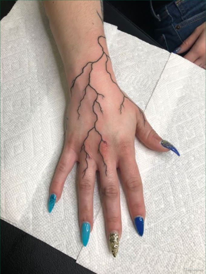 lightning hand tattoo