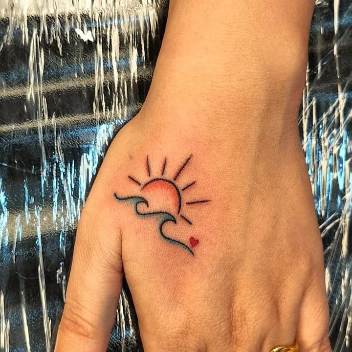 small sun tattoo