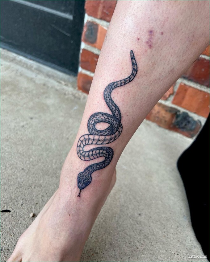 snake foot tattoo 