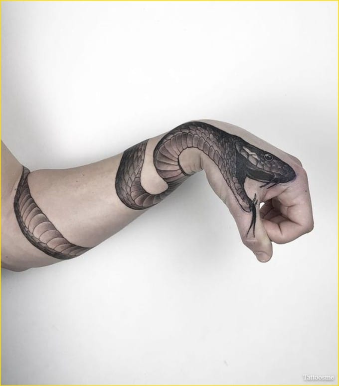 snake wrapped around arm tattoo 