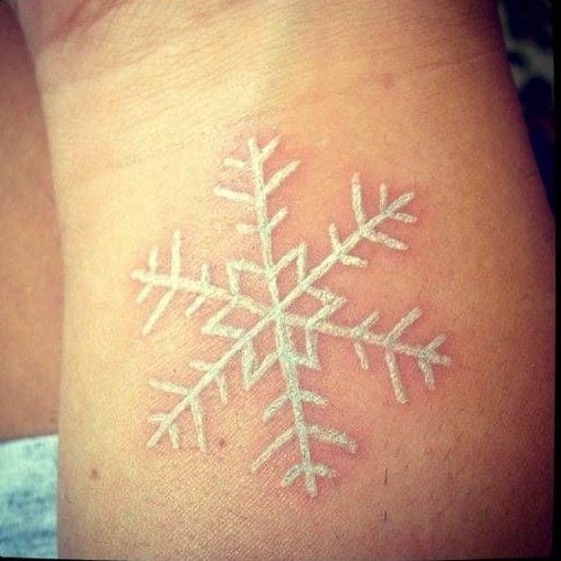 white ink snow flake tattoos