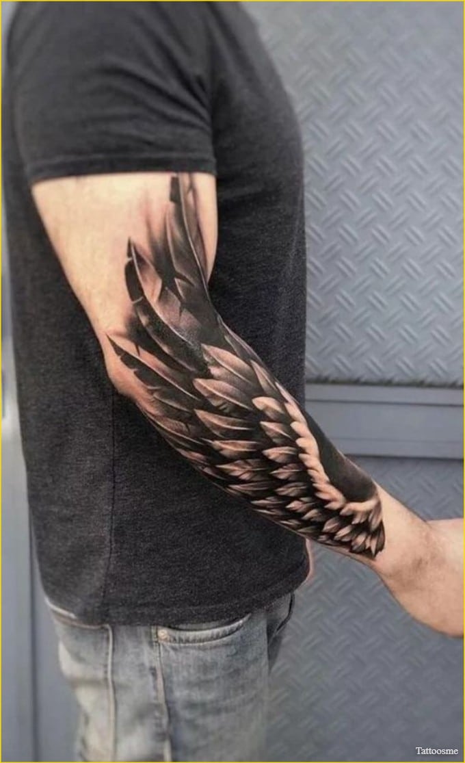 wing tattoo on arm