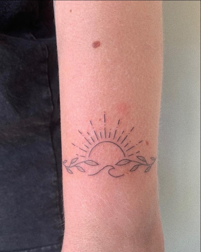 sun wrist tattoos