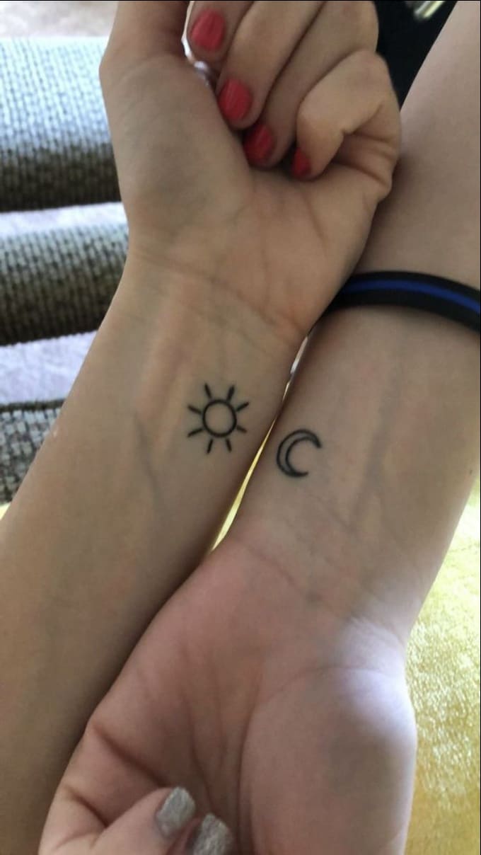 moon and sun couple wrist tattoos