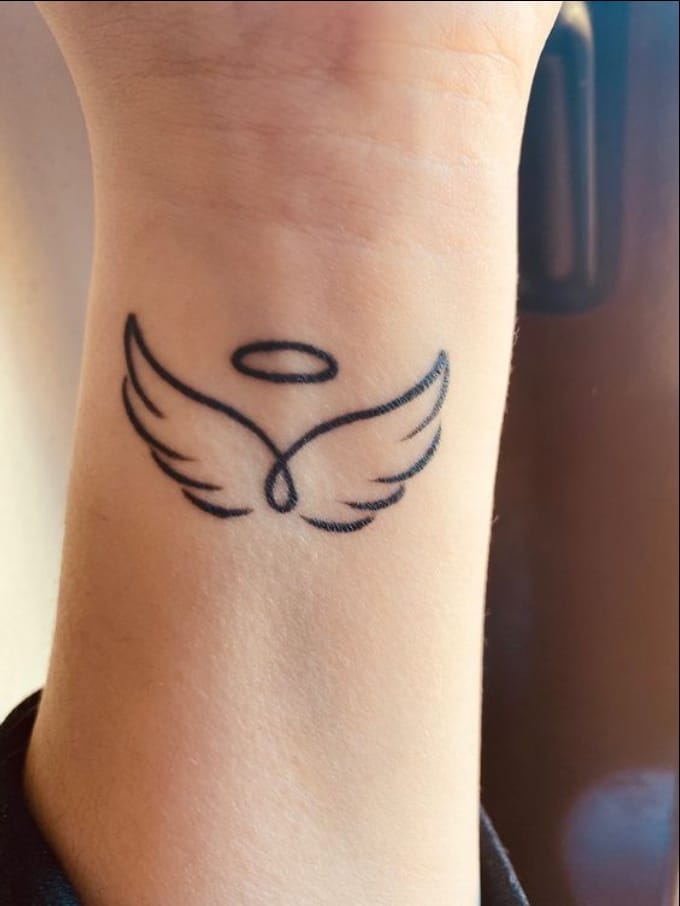 angel wings wrist tattoos