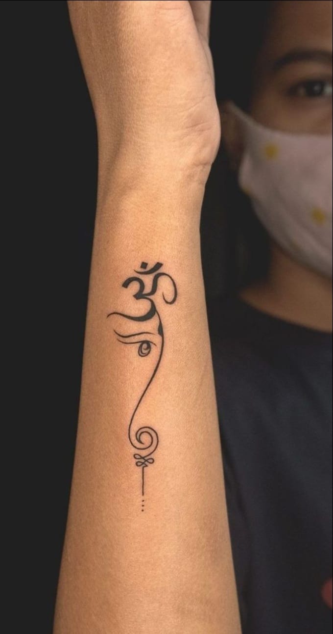 lord ganesha tattoos on wrist