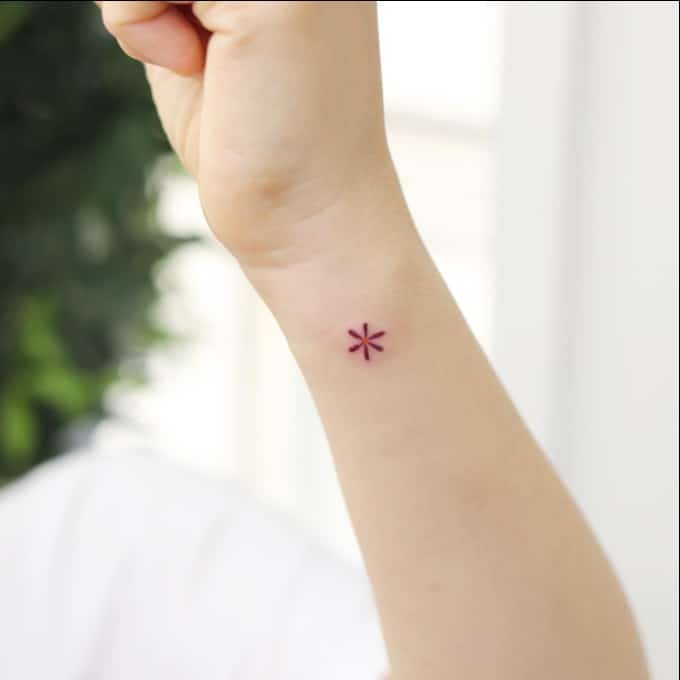 snow flake wrist tattoos